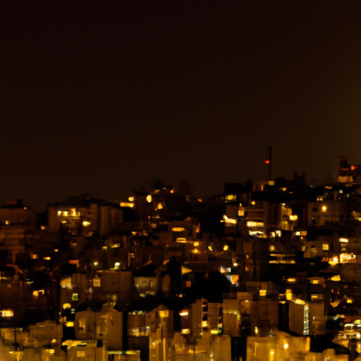 3. תמונה יפהפייה של הנוף העירוני של עמאן בלילה, המדגישה את הפוטנציאל של תחנת ביניים ירדנית.